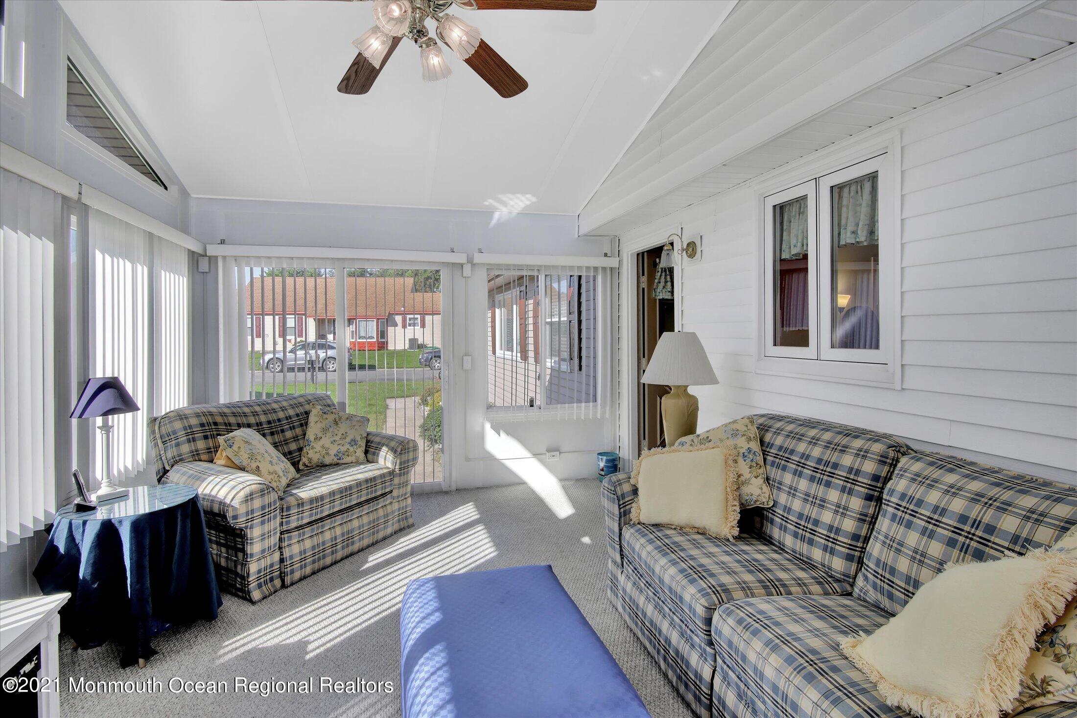 17 Ashley Road Whiting, NJ 08759 - Photo 19 of 31 a living room with furniture and a large window