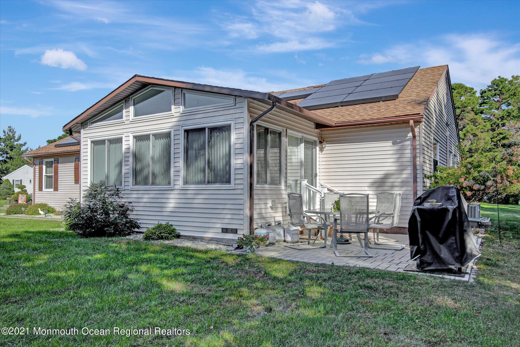 17 Ashley Road Whiting, NJ 08759 - Photo 3 of 31 a front view of house with yard and outdoor seating