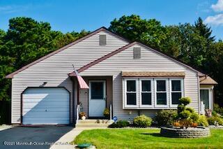 17 Ashley Road Whiting, NJ 08759 - Photo 31 of 31 a front view of a house with a yard