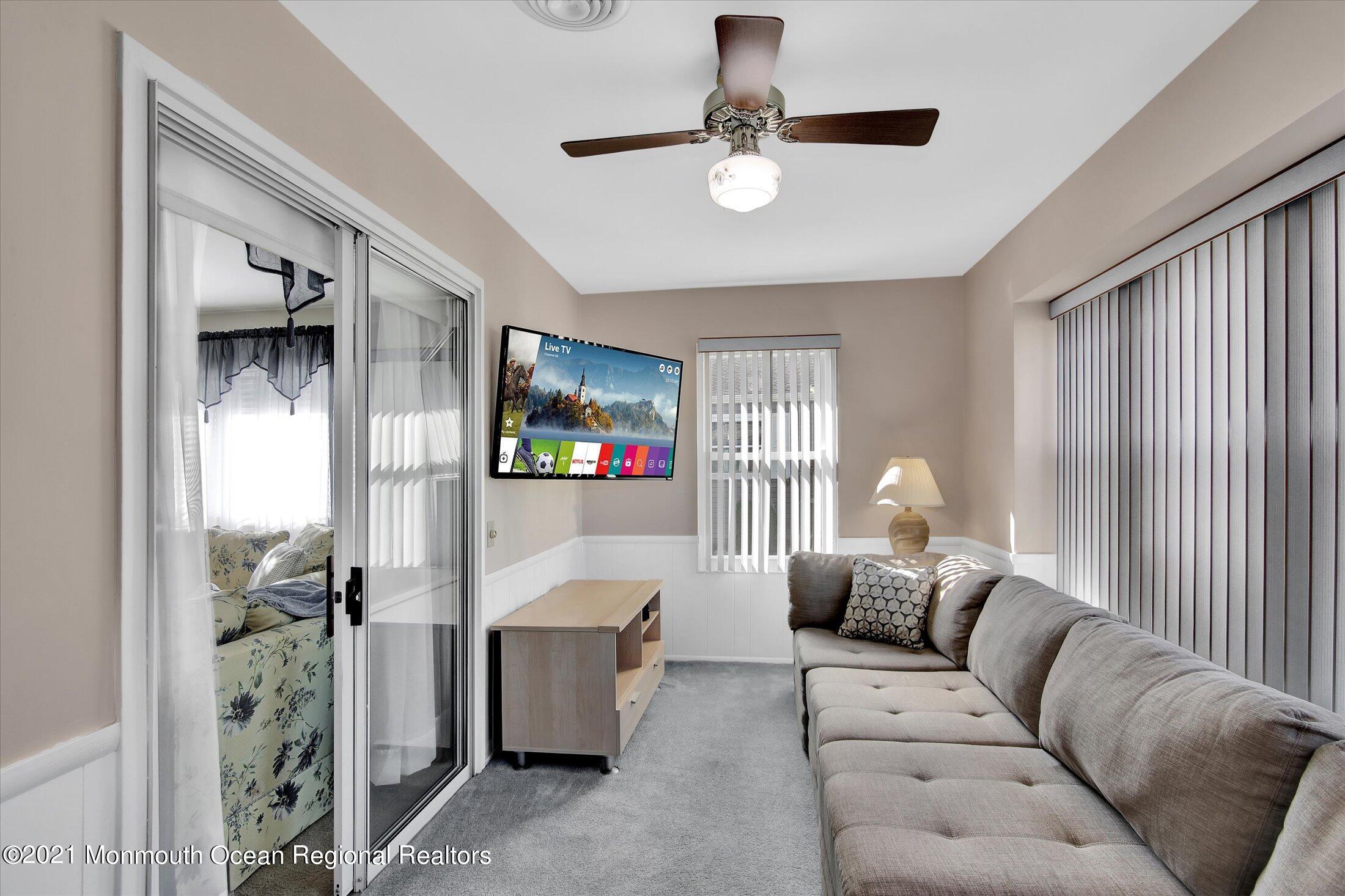 17 Ashley Road Whiting, NJ 08759 - Photo 5 of 31 a living room with furniture and a flat screen tv