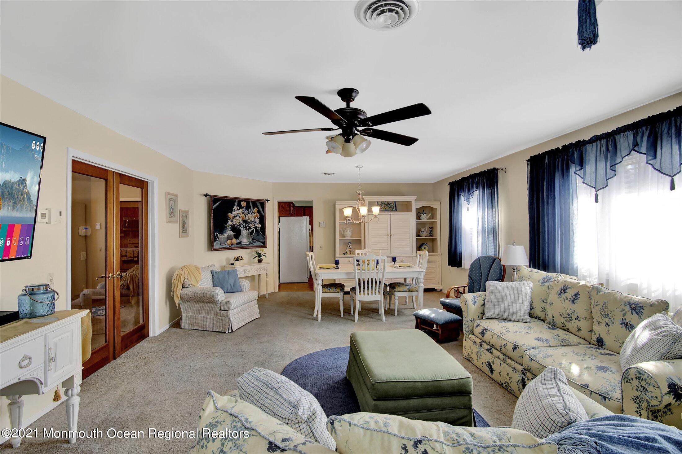 17 Ashley Road Whiting, NJ 08759 - Photo 7 of 31 a living room with furniture and a large window