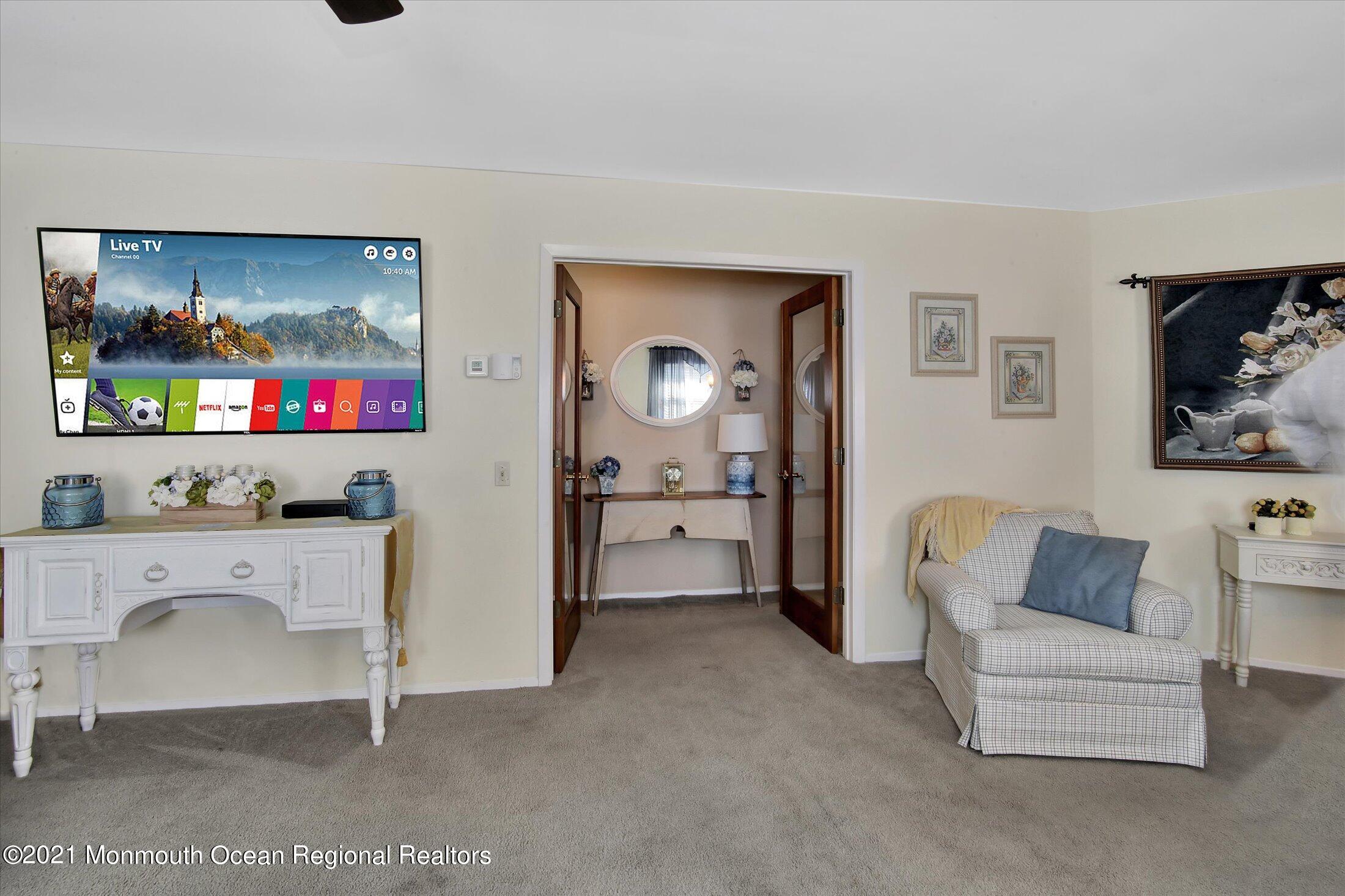 17 Ashley Road Whiting, NJ 08759 - Photo 10 of 31 a living room with furniture and a flat screen tv
