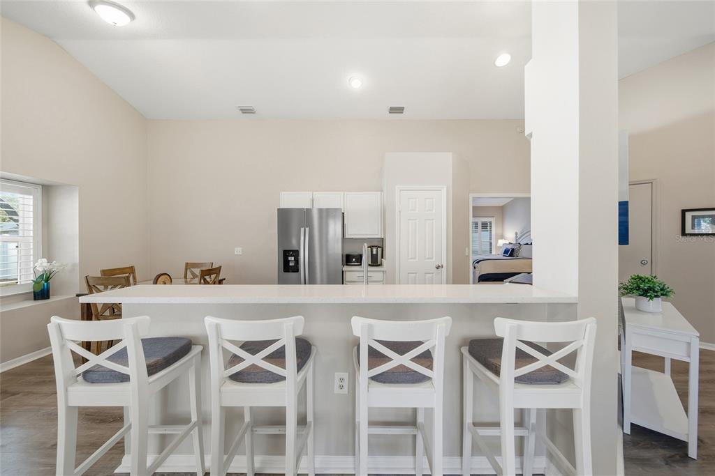 2119 Cattleman Drive Brandon, FL 33511 - Photo 11 of 46 a dining room with a table and chairs in it