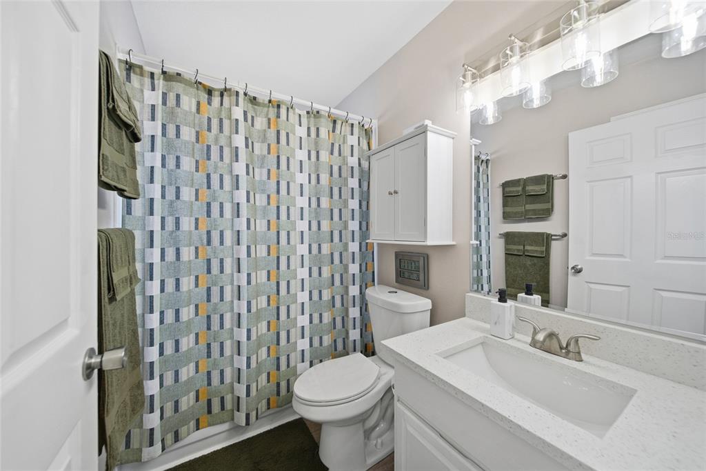 2119 Cattleman Drive Brandon, FL 33511 - Photo 19 of 46 a bathroom with a sink toilet and shower