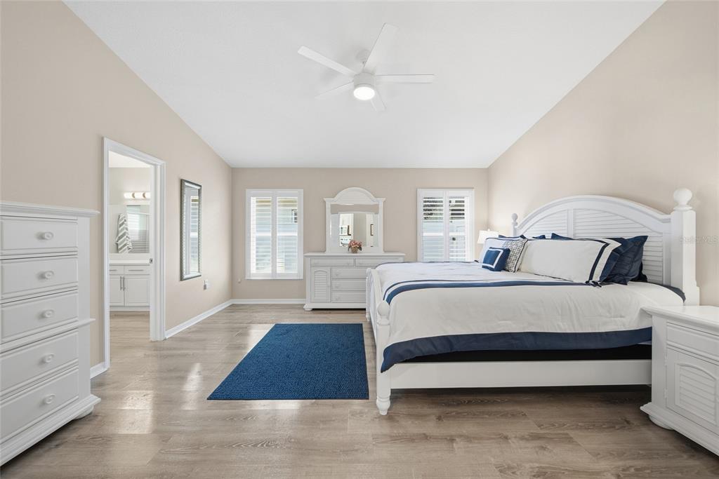 2119 Cattleman Drive Brandon, FL 33511 - Photo 23 of 46 a bedroom with a large bed and a window