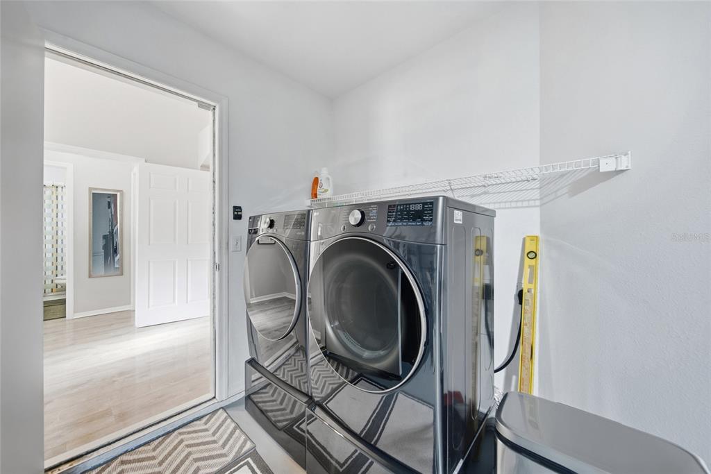 2119 Cattleman Drive Brandon, FL 33511 - Photo 31 of 46 a view of a storage & utility room with racks on the wall