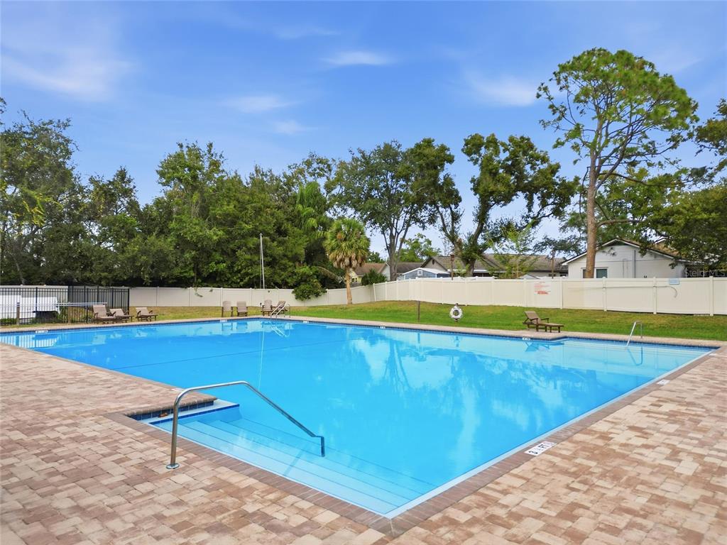 2119 Cattleman Drive Brandon, FL 33511 - Photo 41 of 46 a view of a swimming pool and an outdoor seating