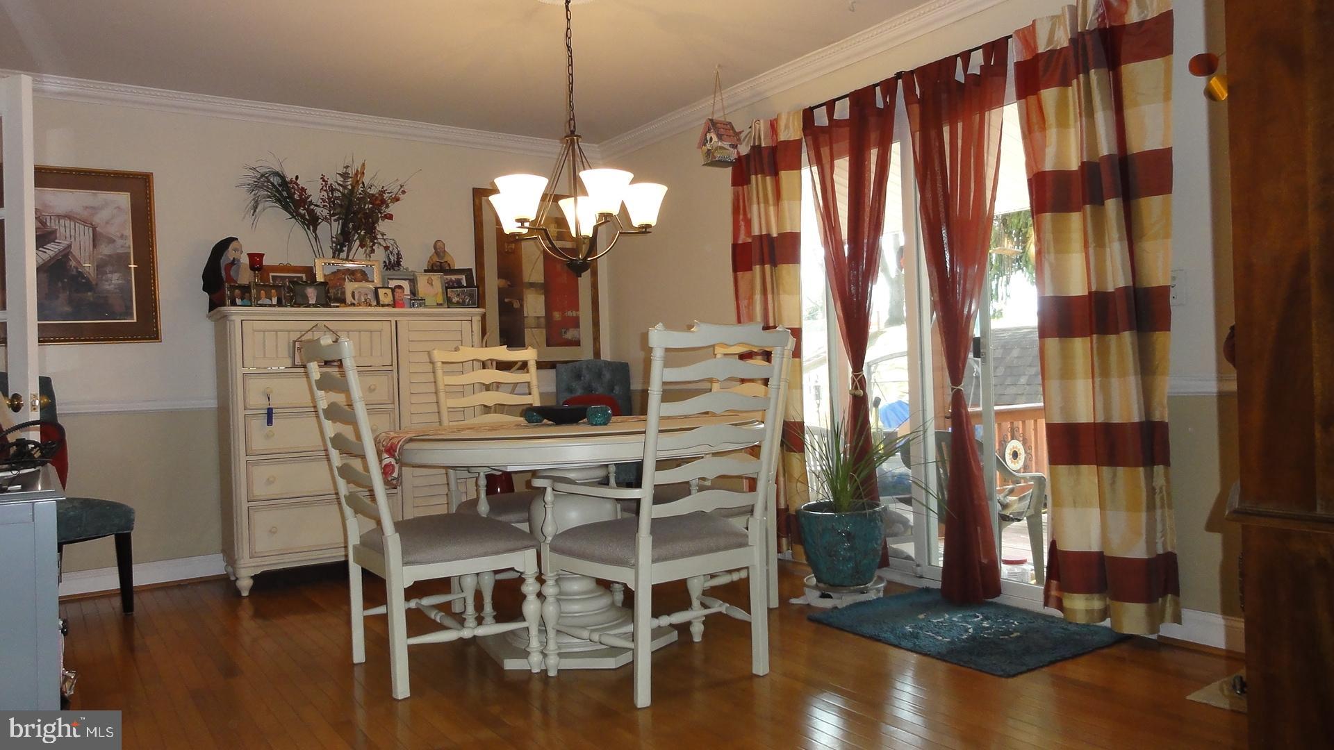 430 Highmeadow Road Reisterstown, MD 21136 - Photo 5 of 36 Dining Room w/HWD & Crown Molding