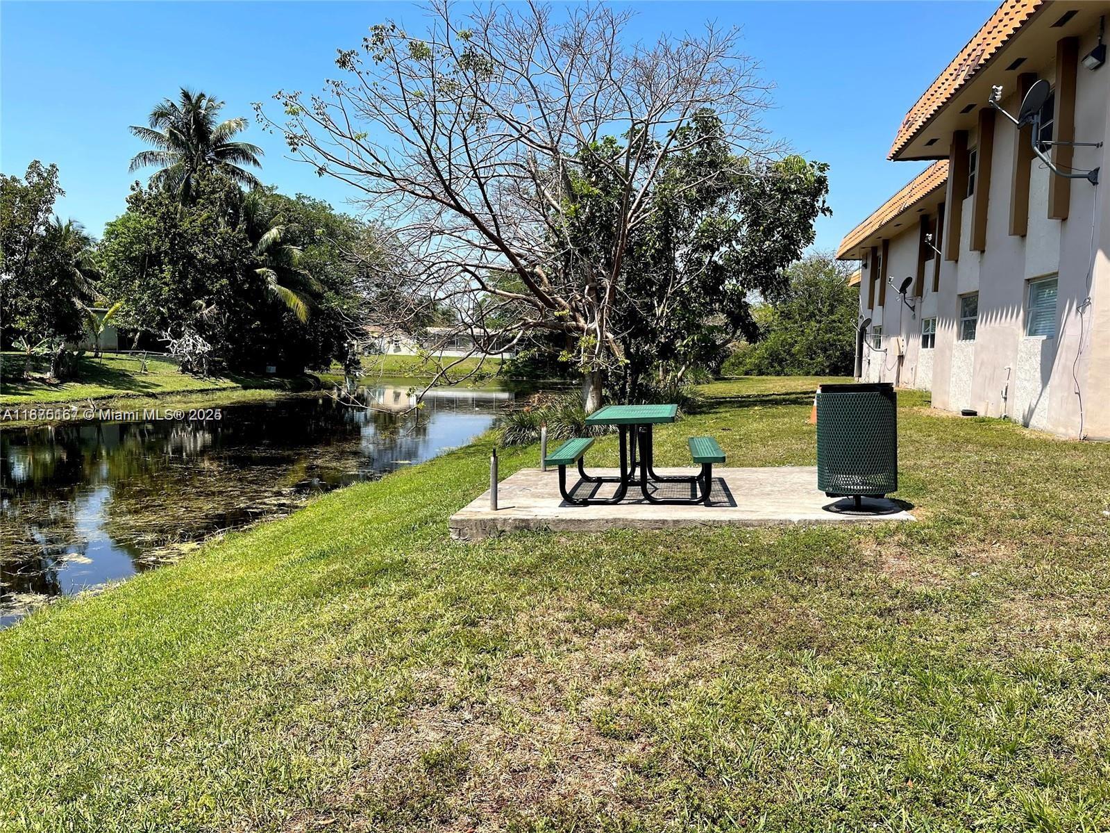 400 Northwest 65th Avenue, Unit 120 Margate, FL 33063 - Photo 17 of 17 a view of a park with large trees