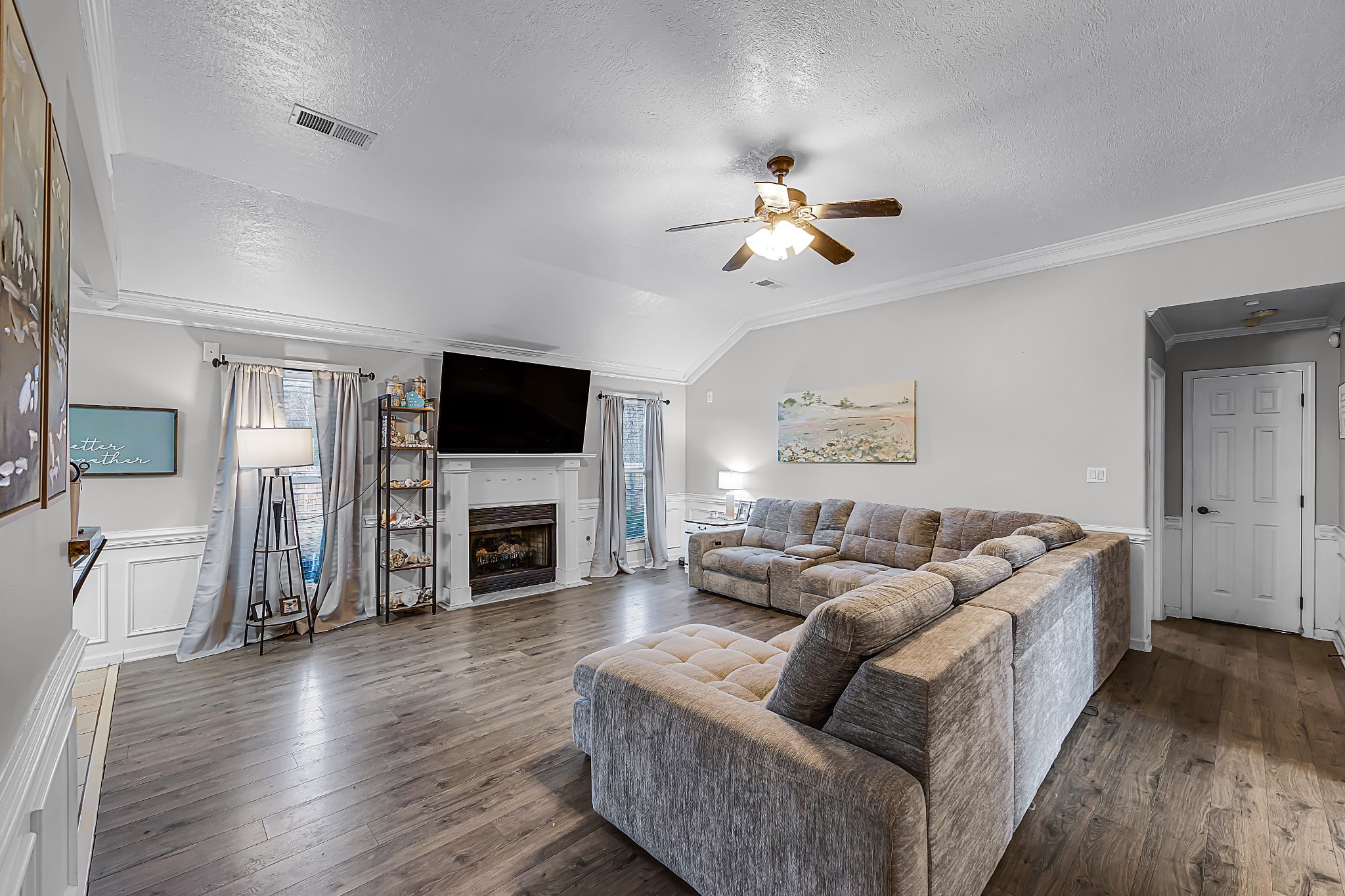 23 Matrix Cove Jackson, TN 38305 - Photo 3 of 16 a living room with fireplace furniture and a wooden floor