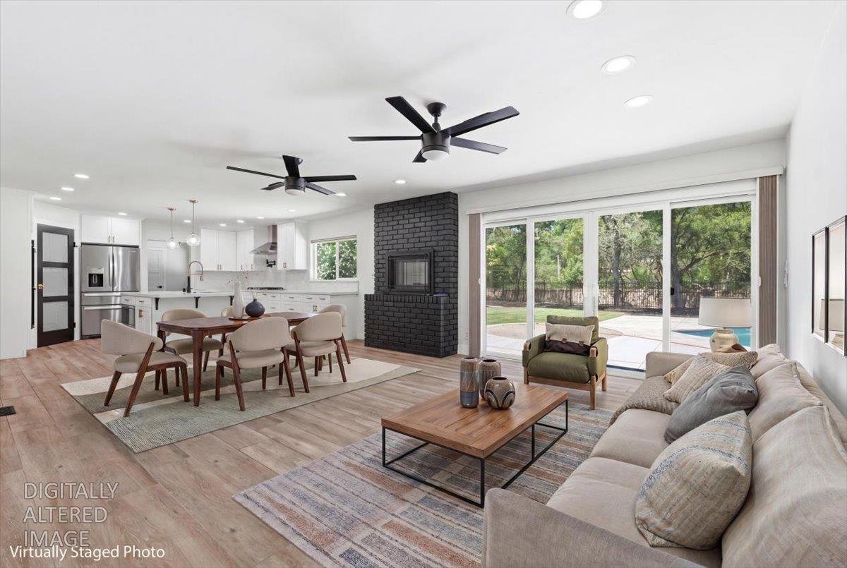 4849 Alexon Way Carmichael, CA 95608 - Photo 3 of 50 a living room with furniture dining table and a large window