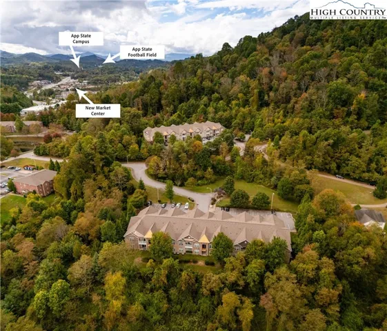 a view of a city with mountains in the background