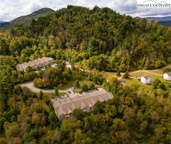 a sign that is on a brick wall