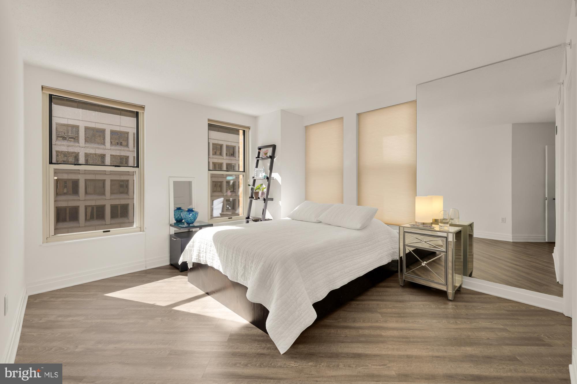 915 E Street Northwest, Unit 815 Washington, DC 20004 - Photo 18 of 26 Bright and airy 2nd bedroom w/ ensuite bath
