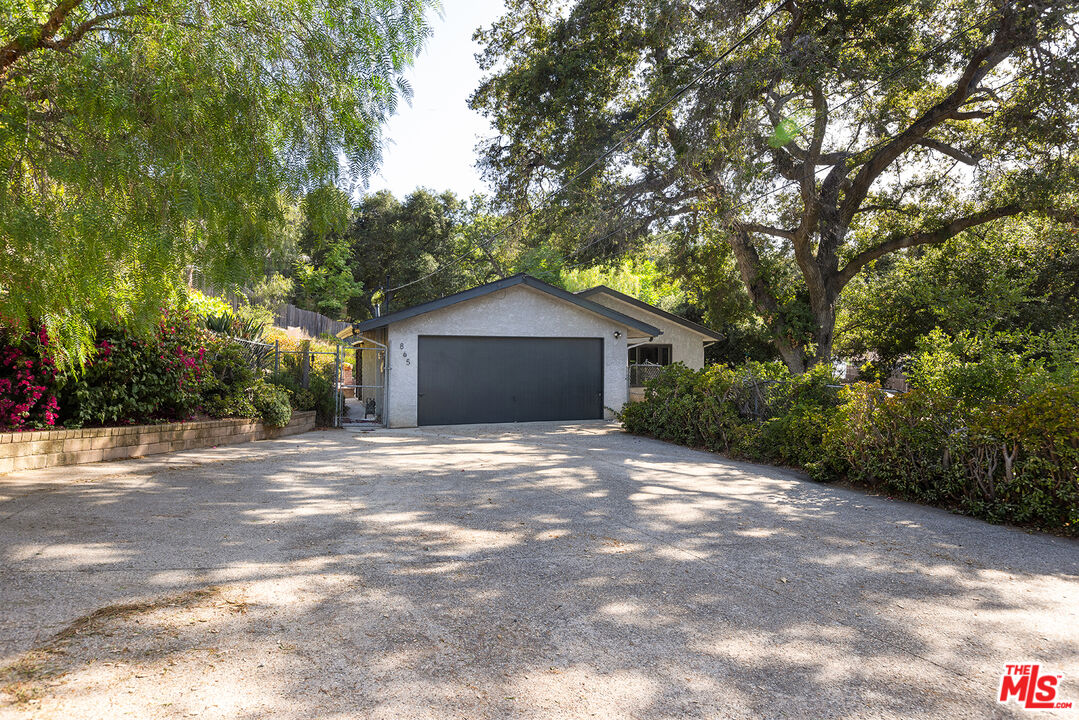 865 Katherine Road Simi Valley, CA 93063 - Photo 23 of 25 a view of a house with a tree in front of it