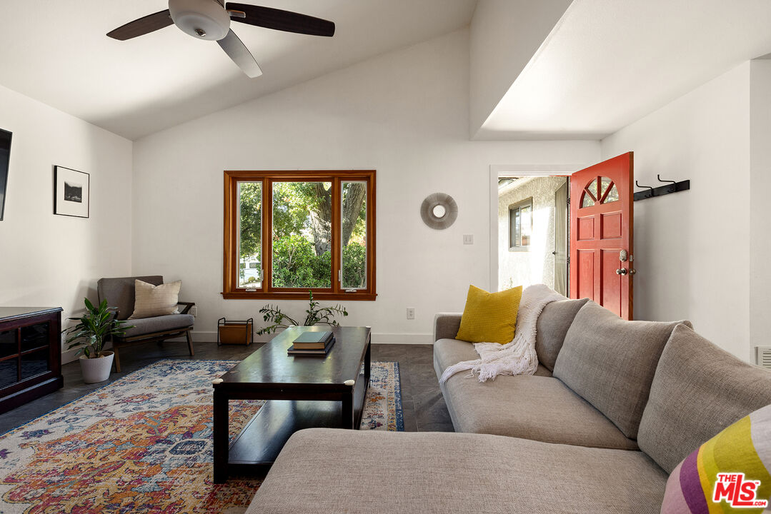 865 Katherine Road Simi Valley, CA 93063 - Photo 3 of 25 a living room with furniture and a window