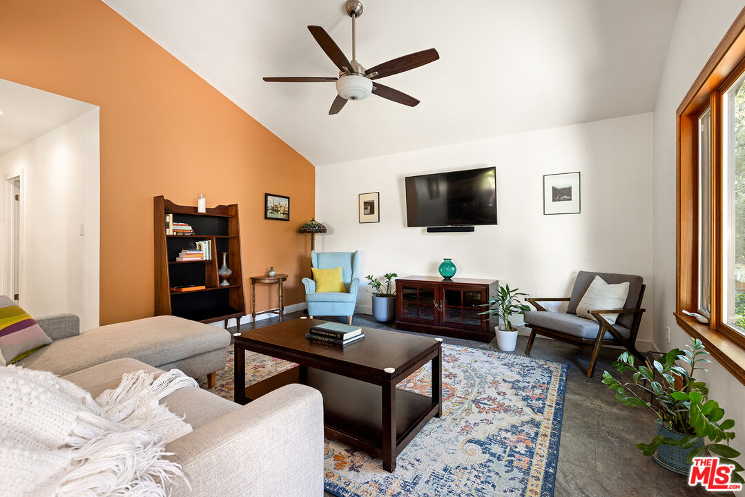 865 Katherine Road Simi Valley, CA 93063 - Photo 4 of 25 a living room with furniture ceiling fan and a flat screen tv