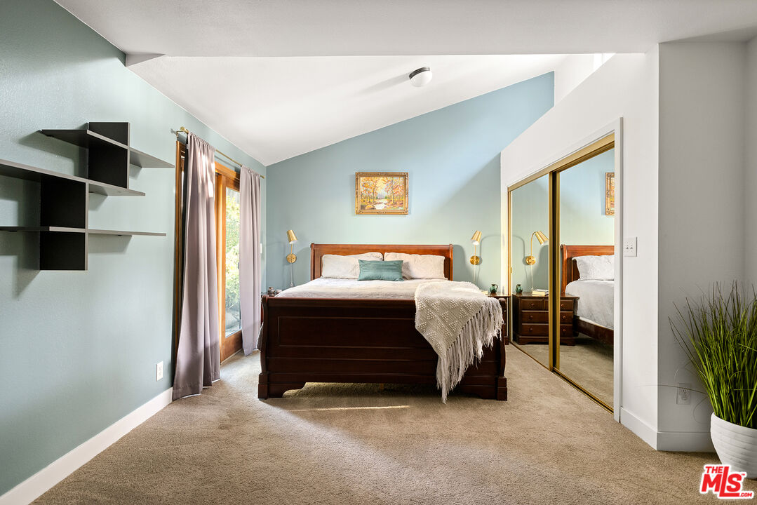 865 Katherine Road Simi Valley, CA 93063 - Photo 8 of 25 a bedroom with a bed and a potted plant