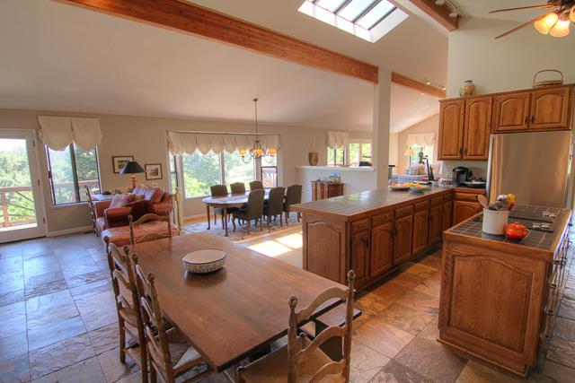 8485 Pharmer Road Gilroy, CA 95020 - Photo 11 of 47 a view of a dining room with furniture window and wooden floor