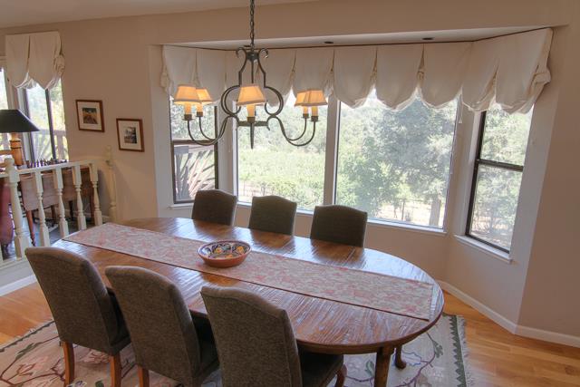 8485 Pharmer Road Gilroy, CA 95020 - Photo 13 of 47 a dining room with furniture and window