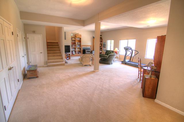 8485 Pharmer Road Gilroy, CA 95020 - Photo 22 of 47 a view of a livingroom with furniture and a window