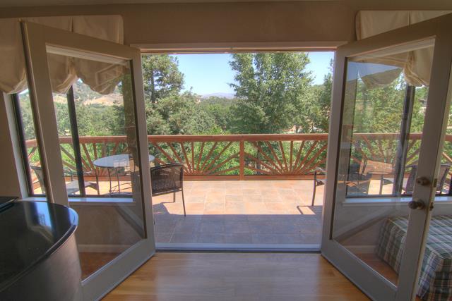 8485 Pharmer Road Gilroy, CA 95020 - Photo 9 of 47 a view of a glass door with a balcony