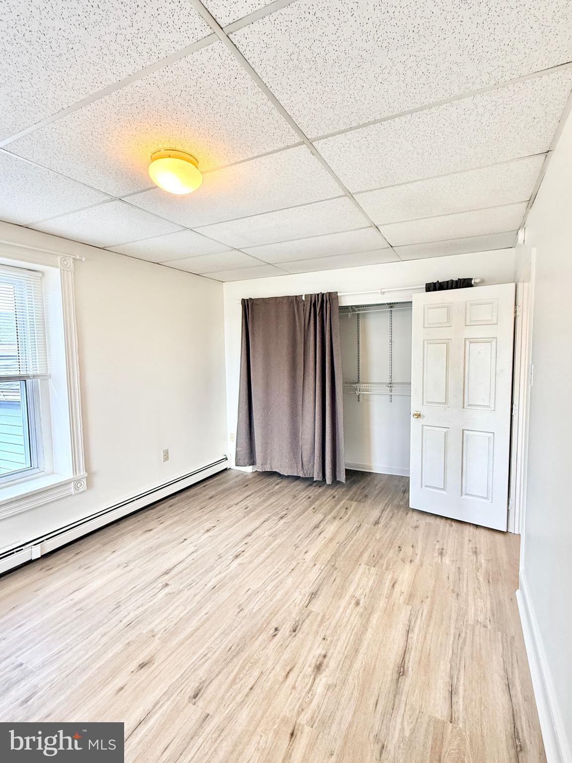 377 West Ridge Pike Royersford, PA 19468 - Photo 11 of 13 a view of empty room with wooden floor