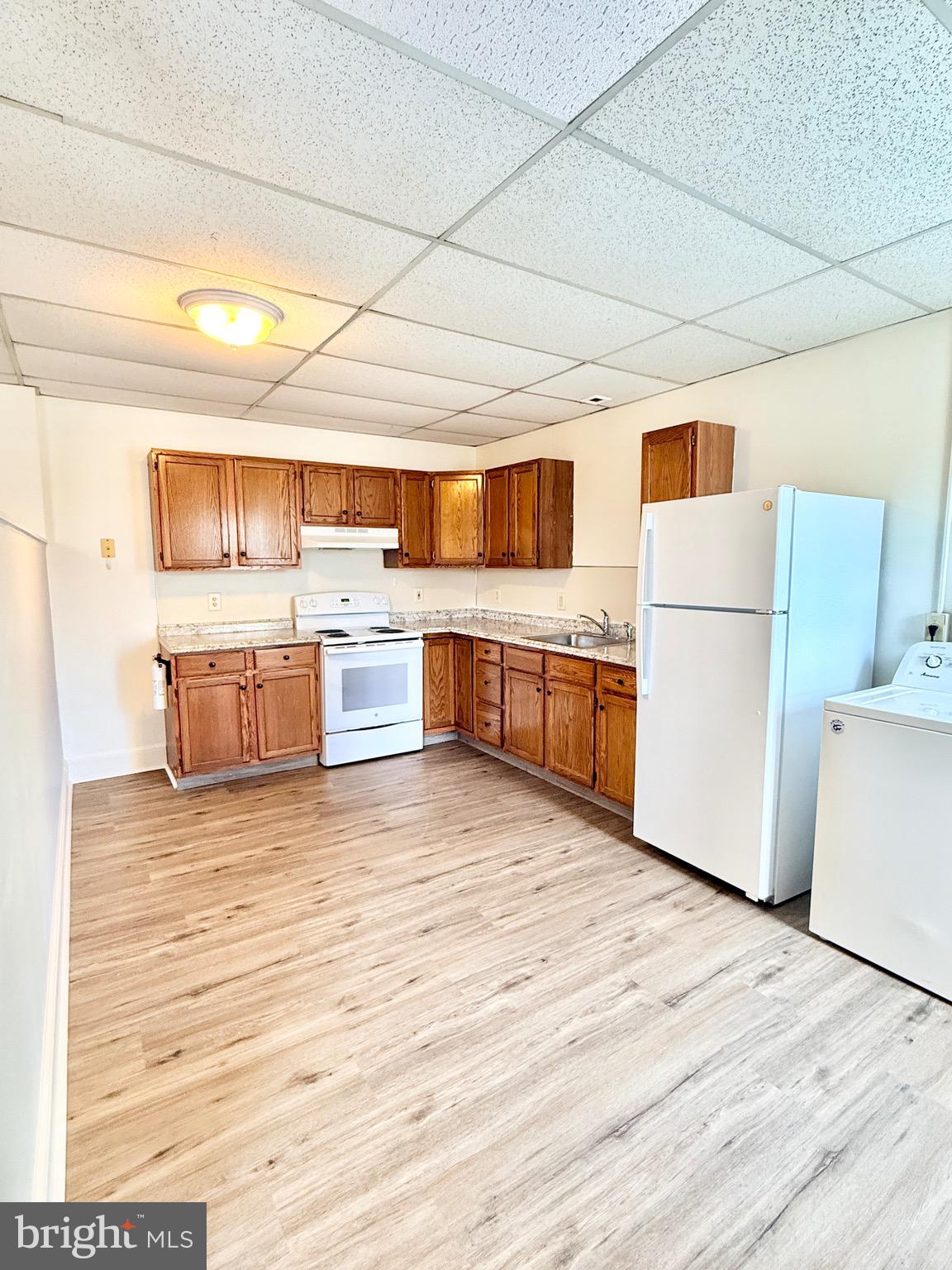 377 West Ridge Pike Royersford, PA 19468 - Photo 6 of 13 a kitchen with stainless steel appliances granite countertop a sink and cabinets