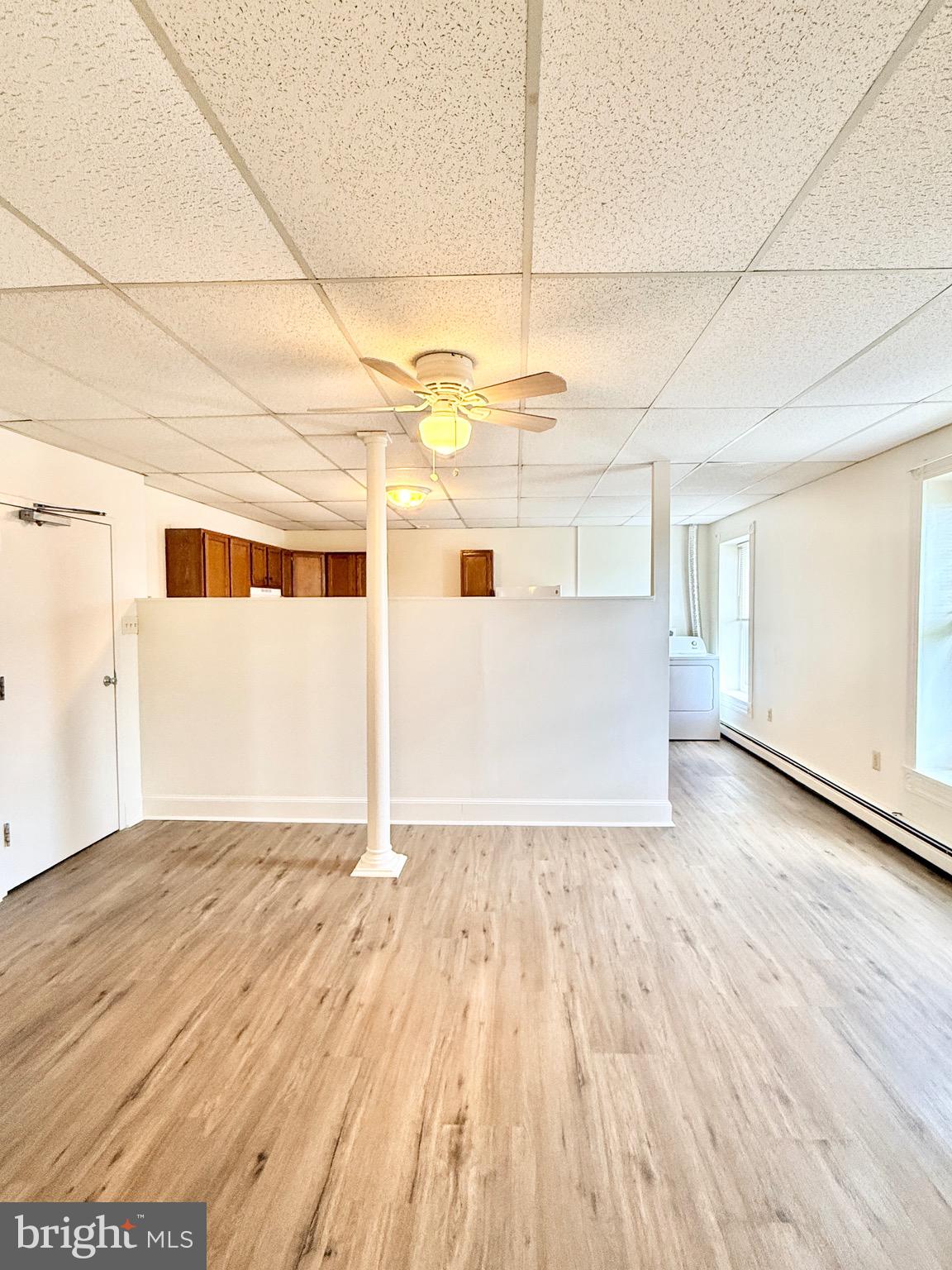 377 West Ridge Pike Royersford, PA 19468 - Photo 7 of 13 an empty room with wooden floor
