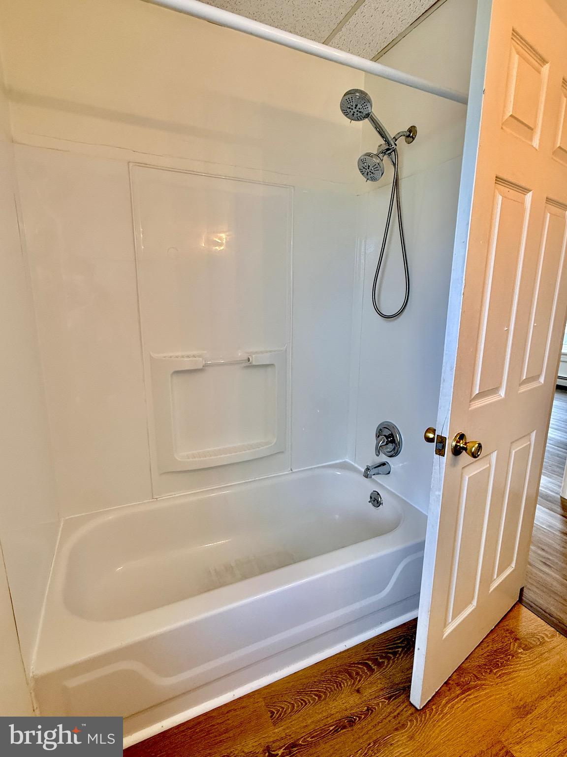 377 West Ridge Pike Royersford, PA 19468 - Photo 9 of 13 a bathroom with a bath tub with a shower