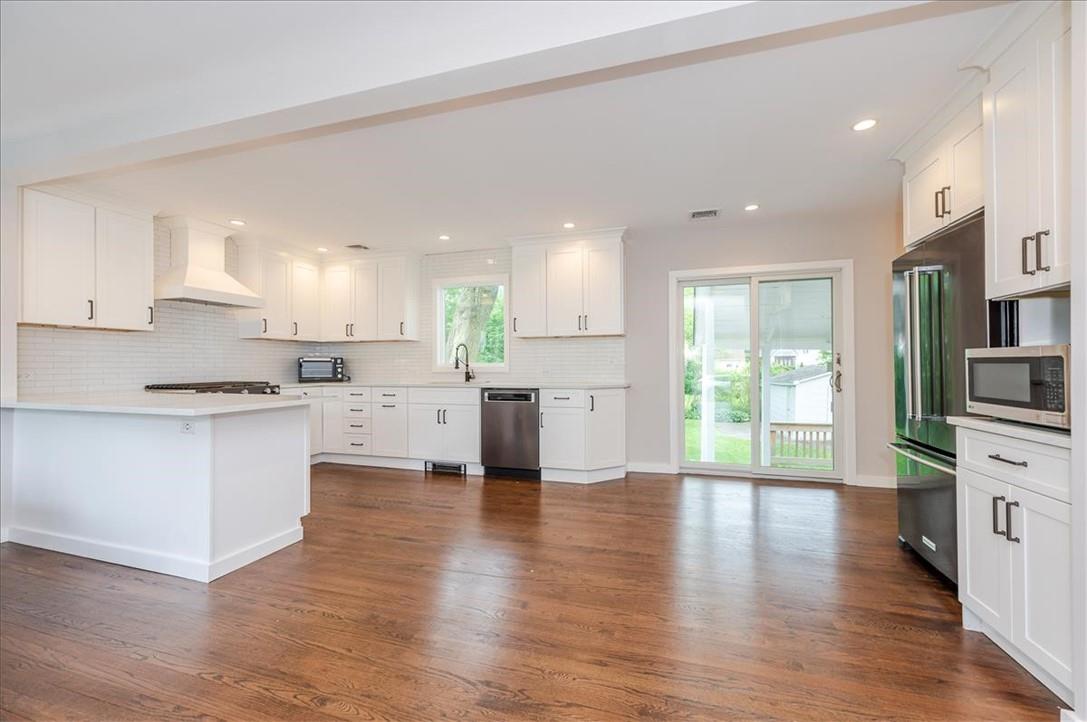 17 Anita Road Yonkers, NY 10708 - Photo 1 of 1 a kitchen with a refrigerator and a stove top oven
