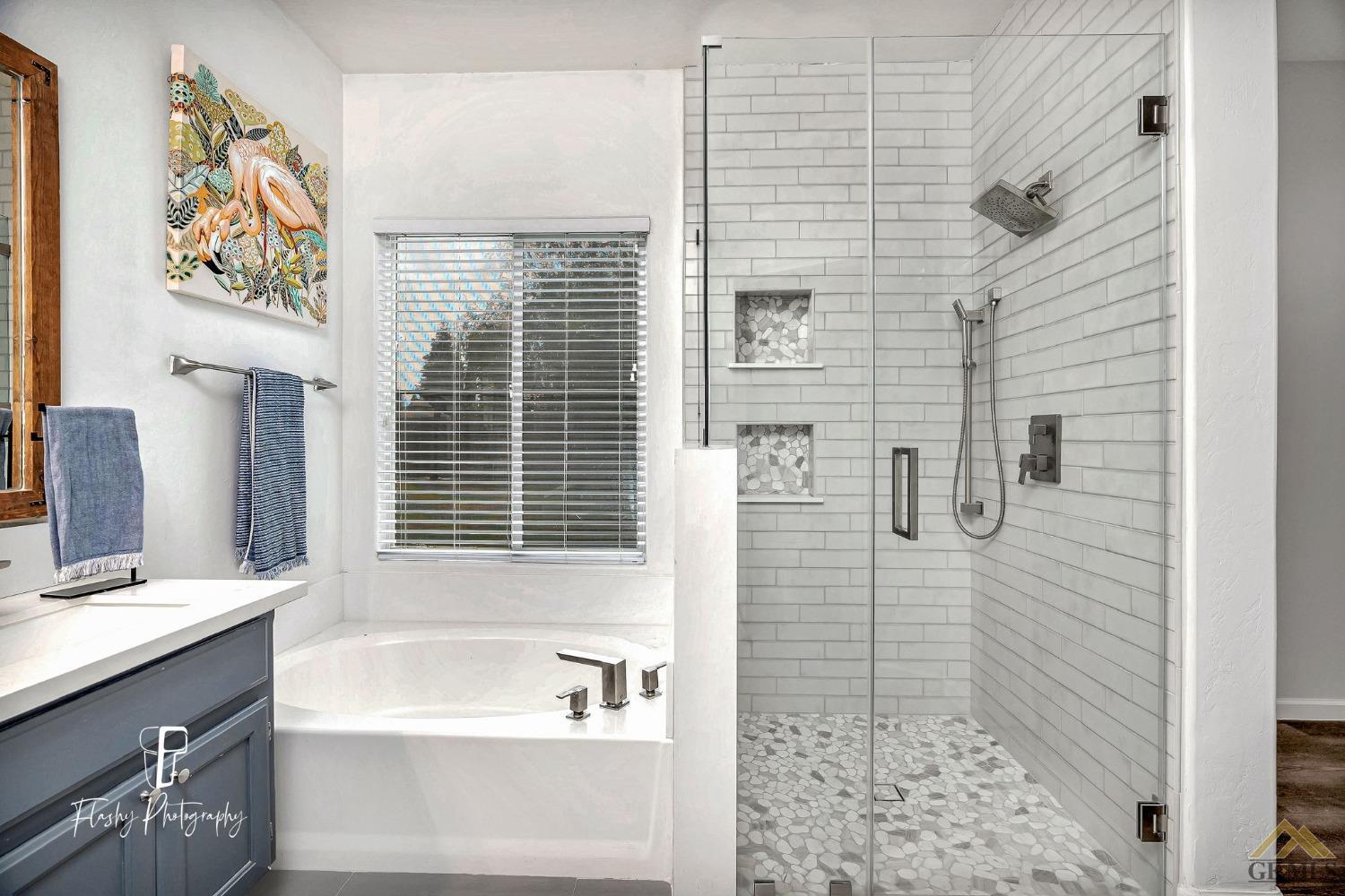 Undisclosed Address Bakersfield, CA 93311 - Photo 31 of 55 a bathroom with a bathtub and a sink