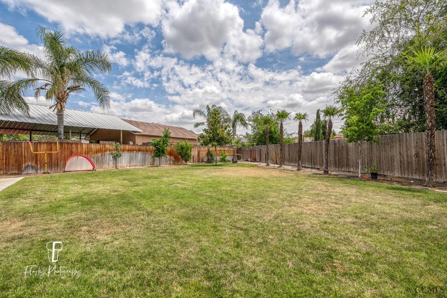 Undisclosed Address Bakersfield, CA 93311 - Photo 49 of 55 a view of a garden