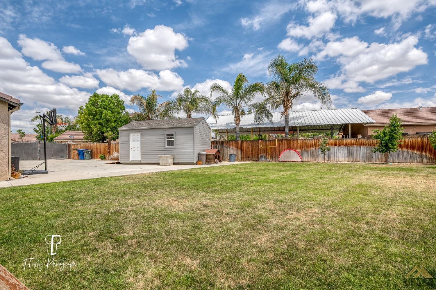 Undisclosed Address Bakersfield, CA 93311 - Photo 52 of 55 a view of a house with a big yard