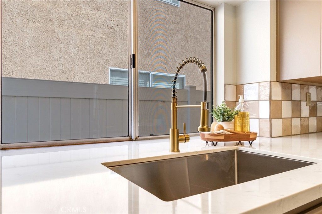 3682 North Pole Lane Riverside, CA 92503 - Photo 14 of 30 a kitchen with a sink and washing machine