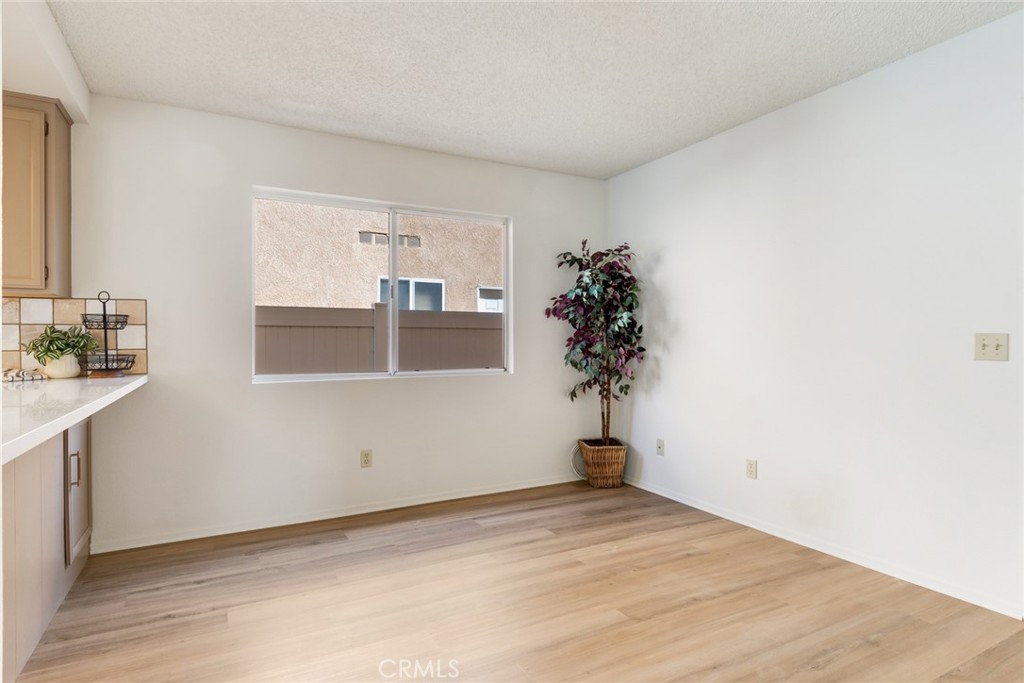 3682 North Pole Lane Riverside, CA 92503 - Photo 15 of 30 a view of empty room with wooden floor and fan