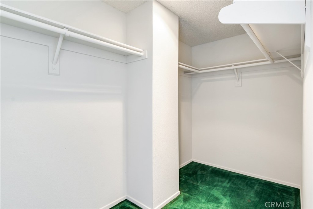 3682 North Pole Lane Riverside, CA 92503 - Photo 23 of 30 a view of an empty walk in closet