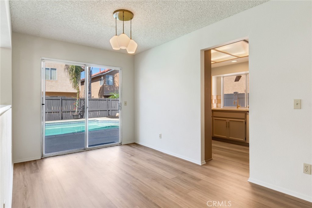 3682 North Pole Lane Riverside, CA 92503 - Photo 9 of 30 a view of livingroom with hardwood floor and a ceiling fan