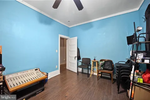 a view of a livingroom with furniture and lounge chair