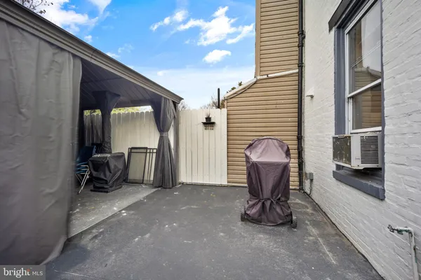 a view of a livingroom with furniture and front door