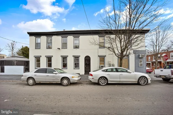 a car parked in front of a house