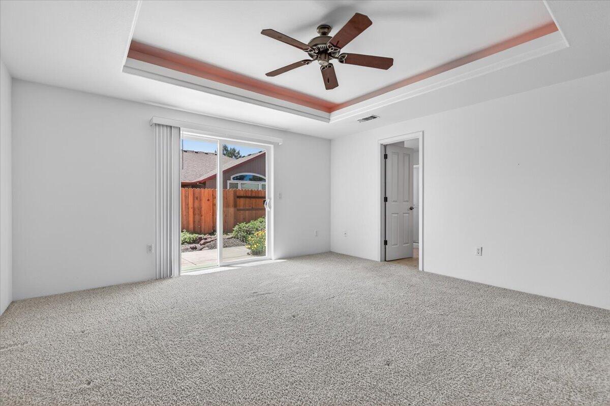 2618 Rabun Way Central Point, OR 97502 - Photo 25 of 42 an empty room with ceiling fan and window