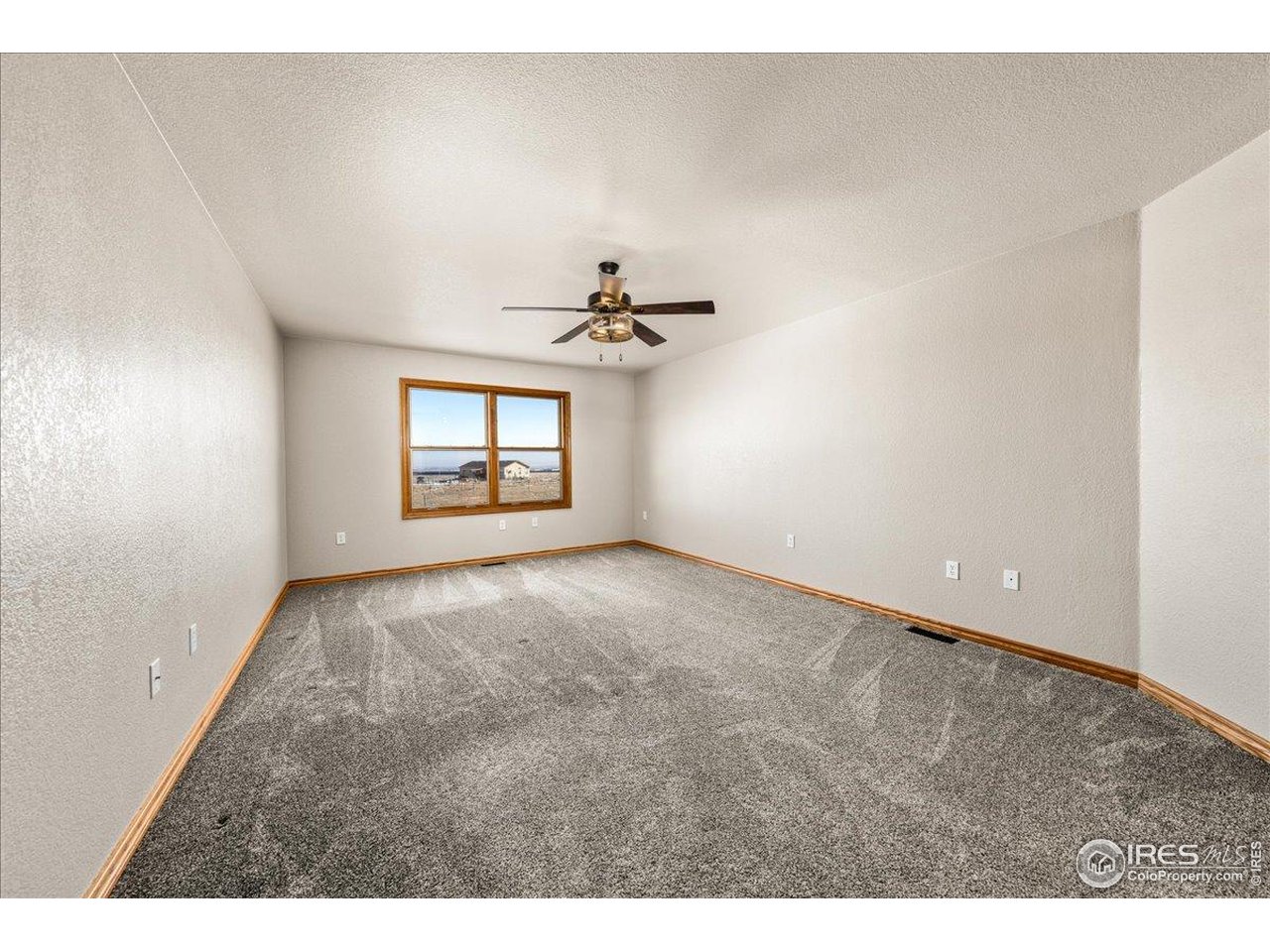 11837 County Road 39 Fort Lupton, CO 80621 - Photo 15 of 43 Primary Bedroom - Main Floor