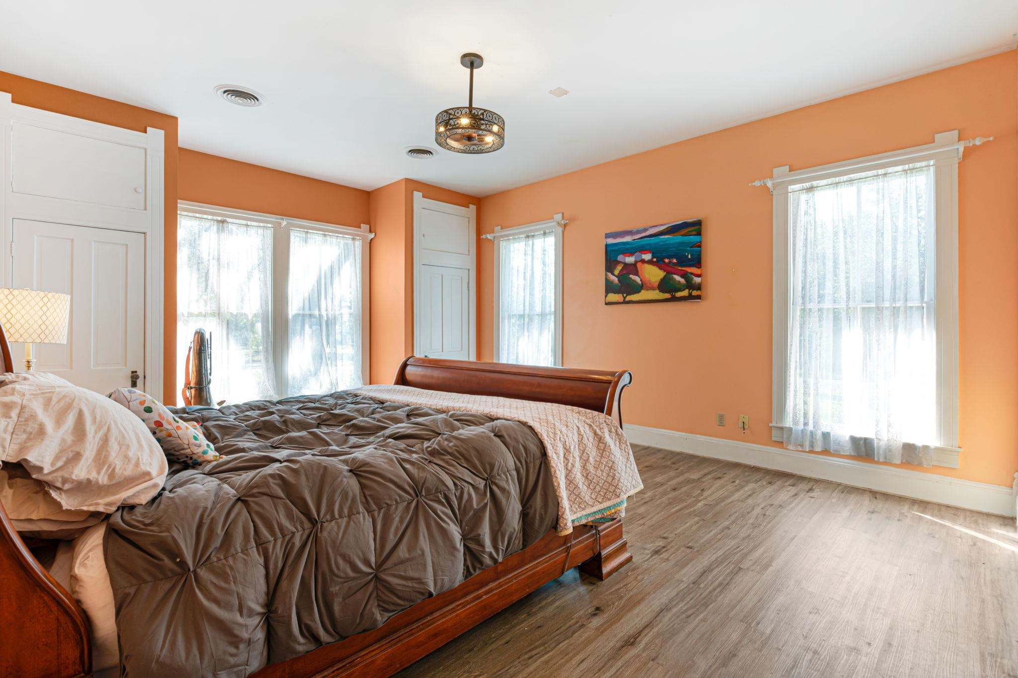 106 South Howe Street Lampasas, TX 76550 - Photo 16 of 29 a bedroom with a bed and window
