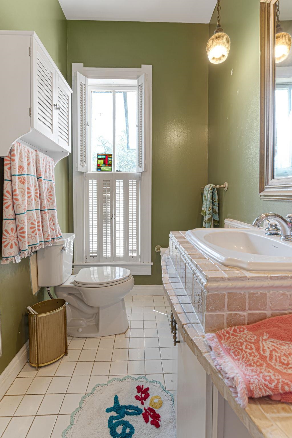 106 South Howe Street Lampasas, TX 76550 - Photo 18 of 29 a bathroom with a tub sink and mirror