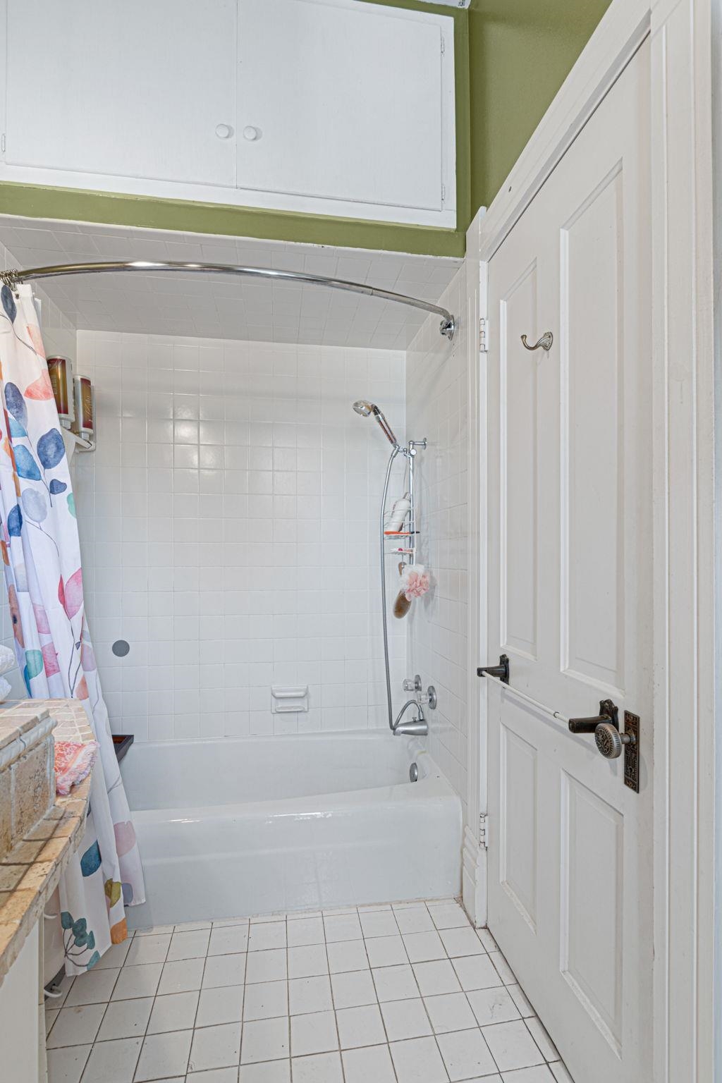 106 South Howe Street Lampasas, TX 76550 - Photo 19 of 29 a bathroom with a bathtub and a shower