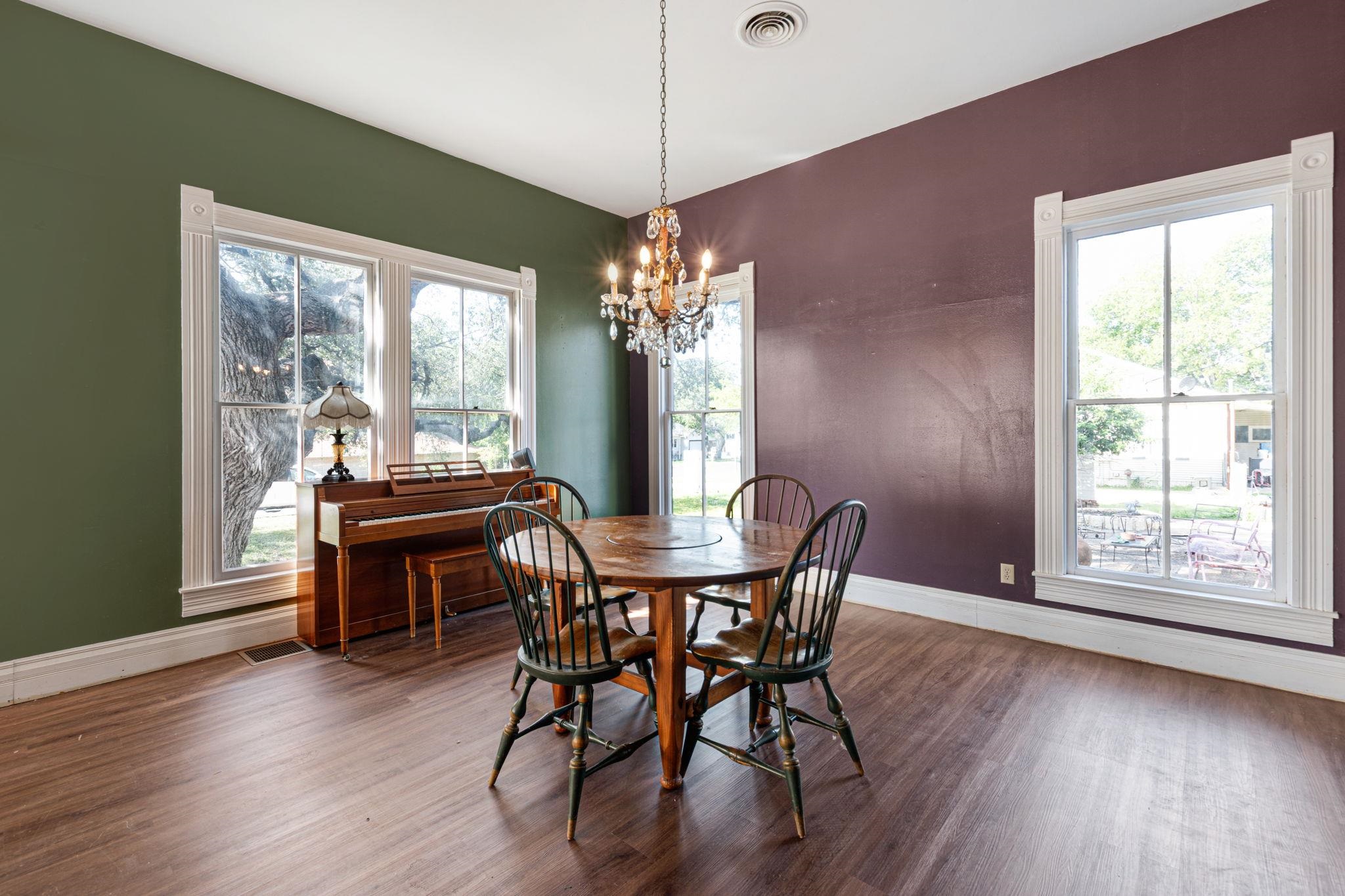 106 South Howe Street Lampasas, TX 76550 - Photo 6 of 29 a dining room with furniture window wooden floor