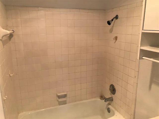 a bathroom with a bathtub