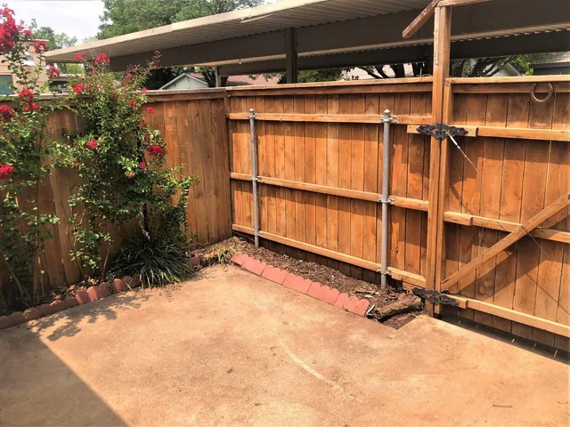 a view of a room with wooden walls
