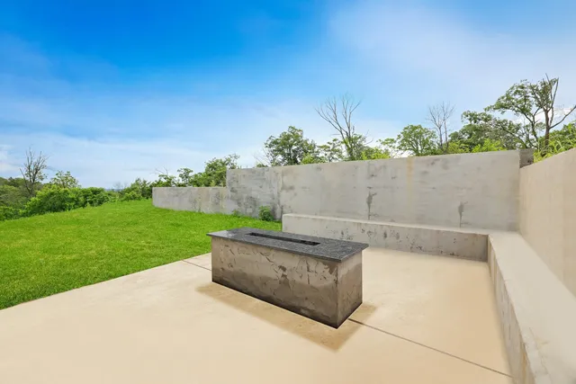 a view of a couches in a backyard